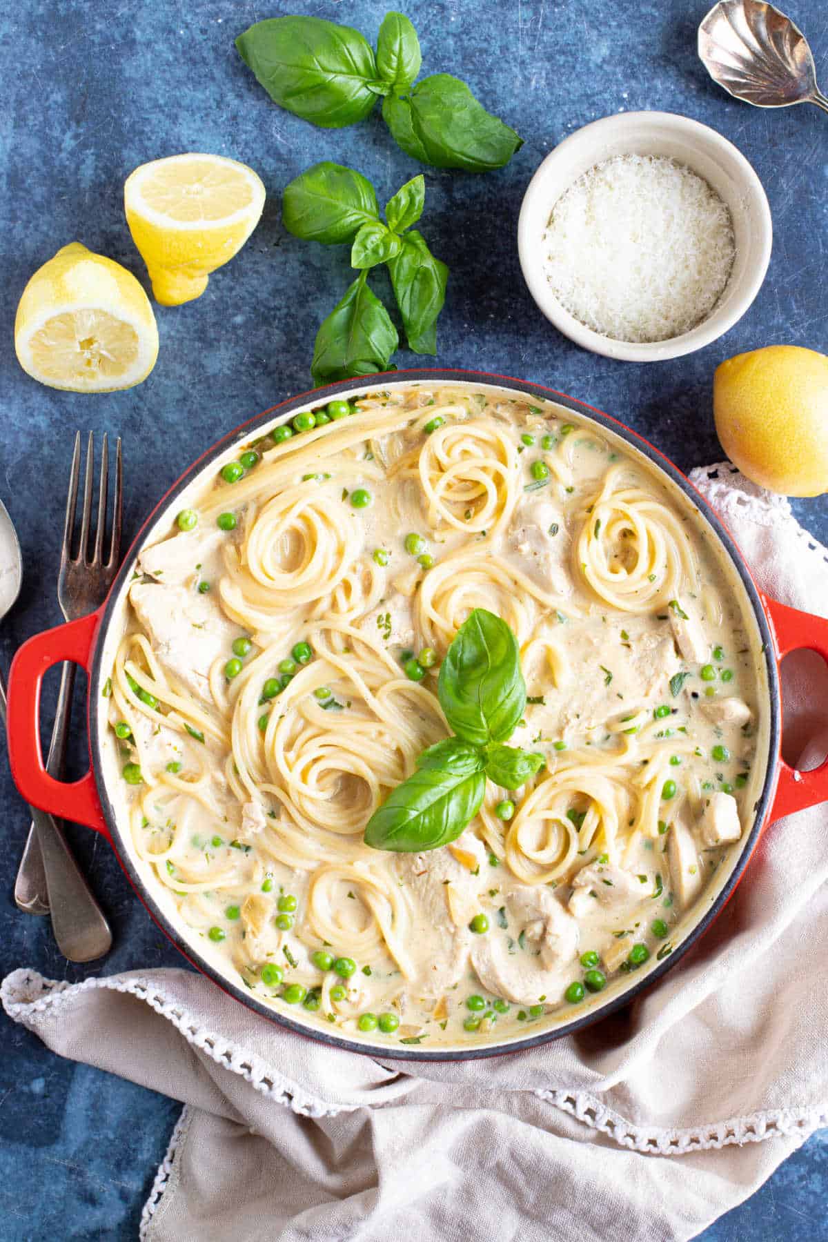 Creamy lemon chicken pasta with basil.