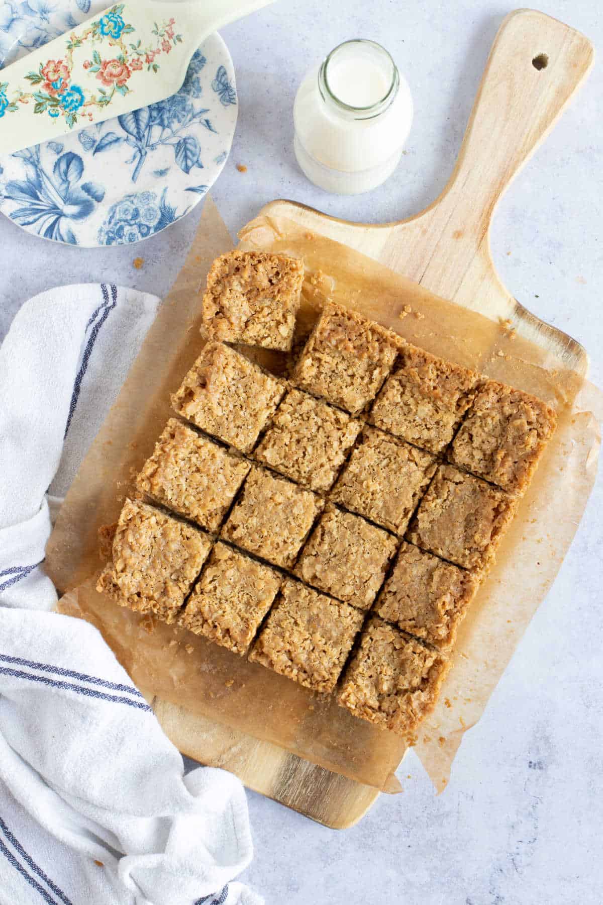 Flapjacks on a chopping board.