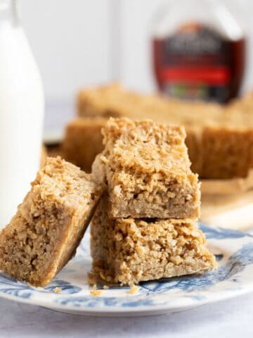Maple syrup flapjacks on a plate.