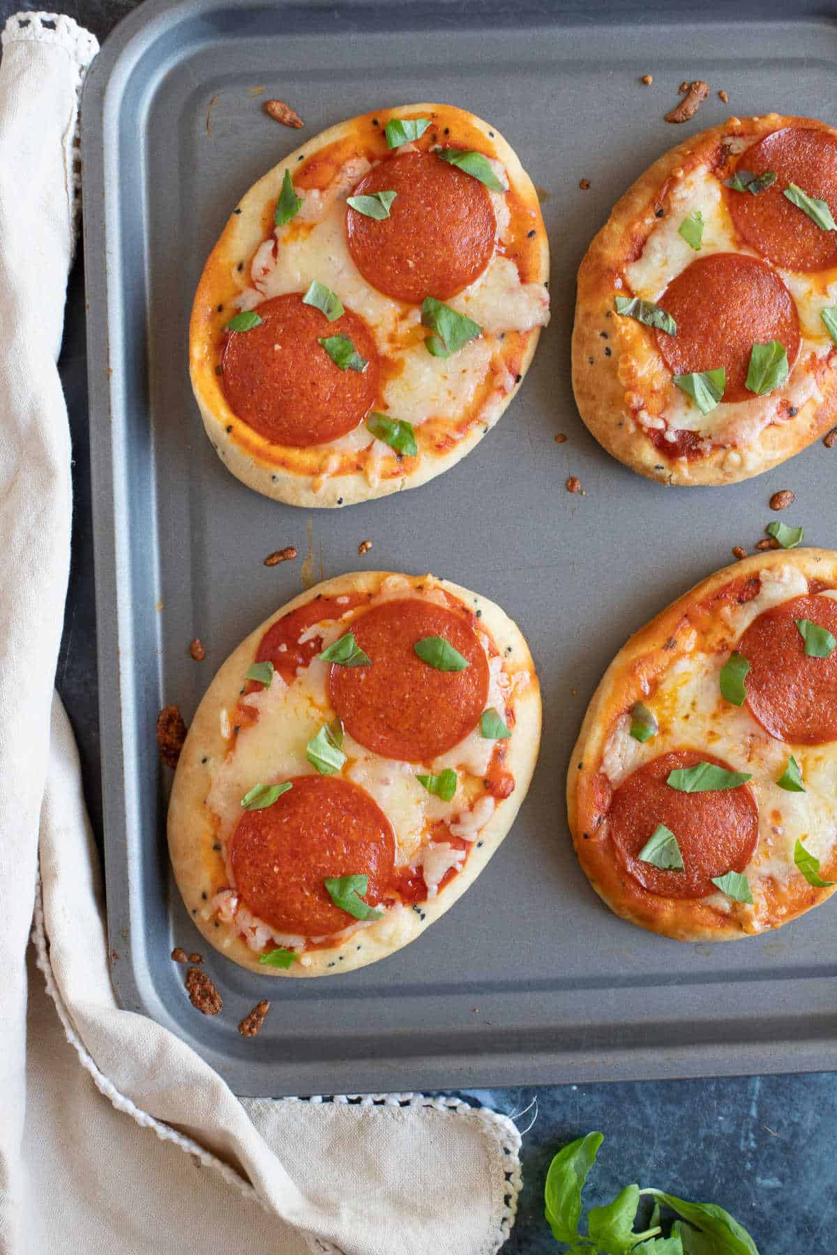 Naan bread pizza with pepperoni.