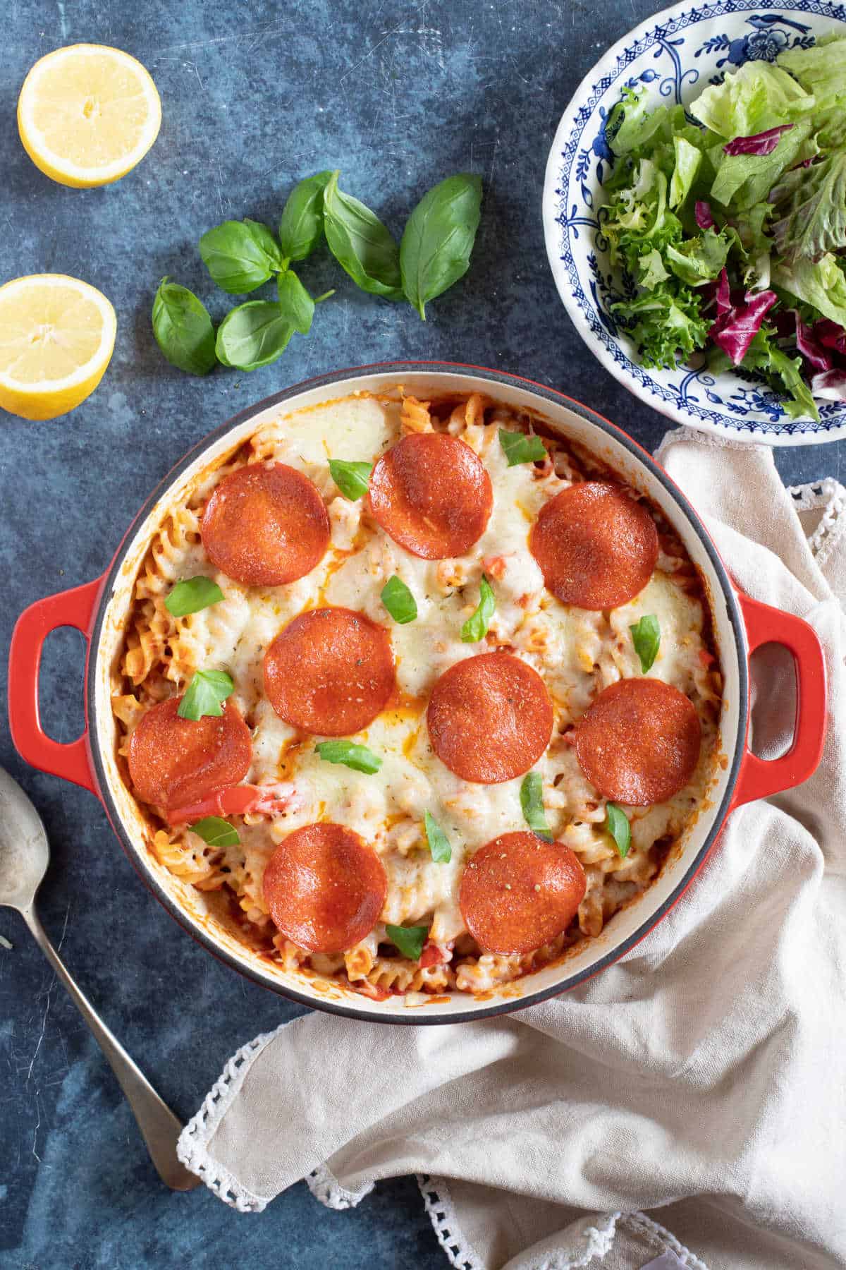 Pizza pasta bake with a green salad.