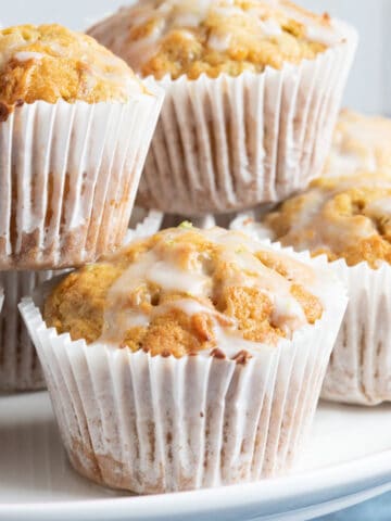 Carrot cake muffins on a cake stand.