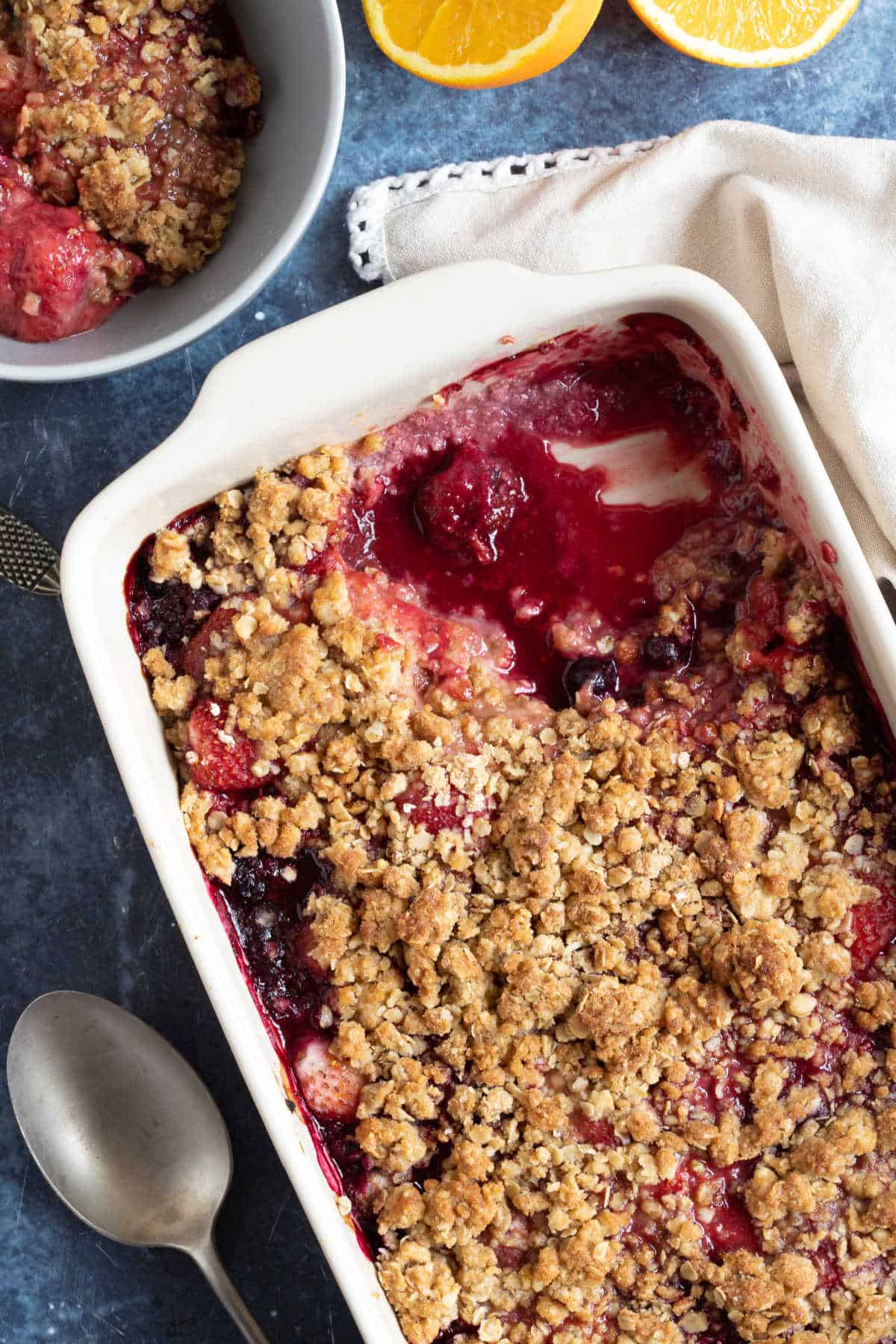 Mixed berry crumble in a pie dish.