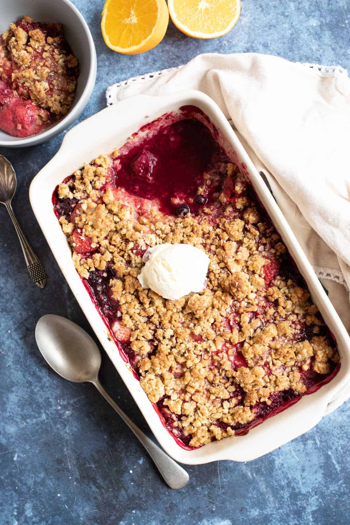 Mixed berry crumble in a pie dish.