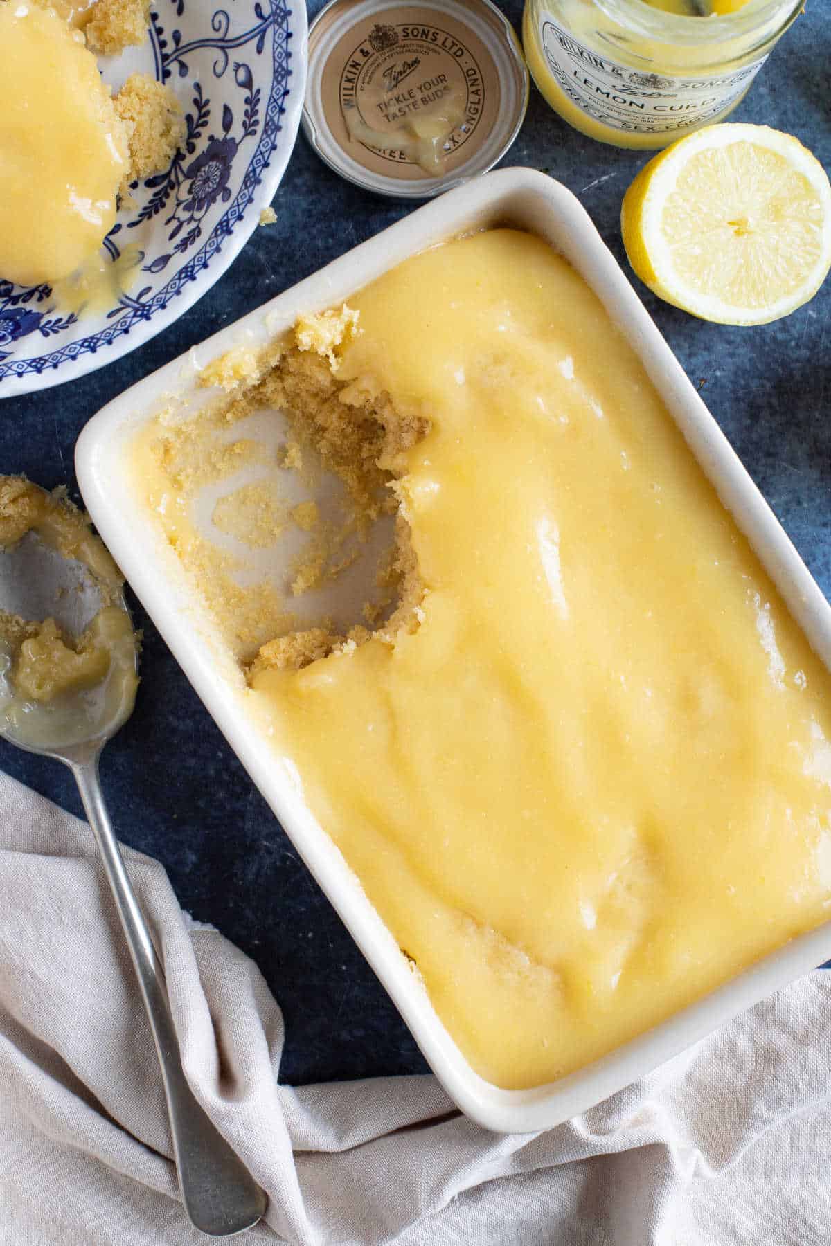 Lemon curd pudding in a serving dish.