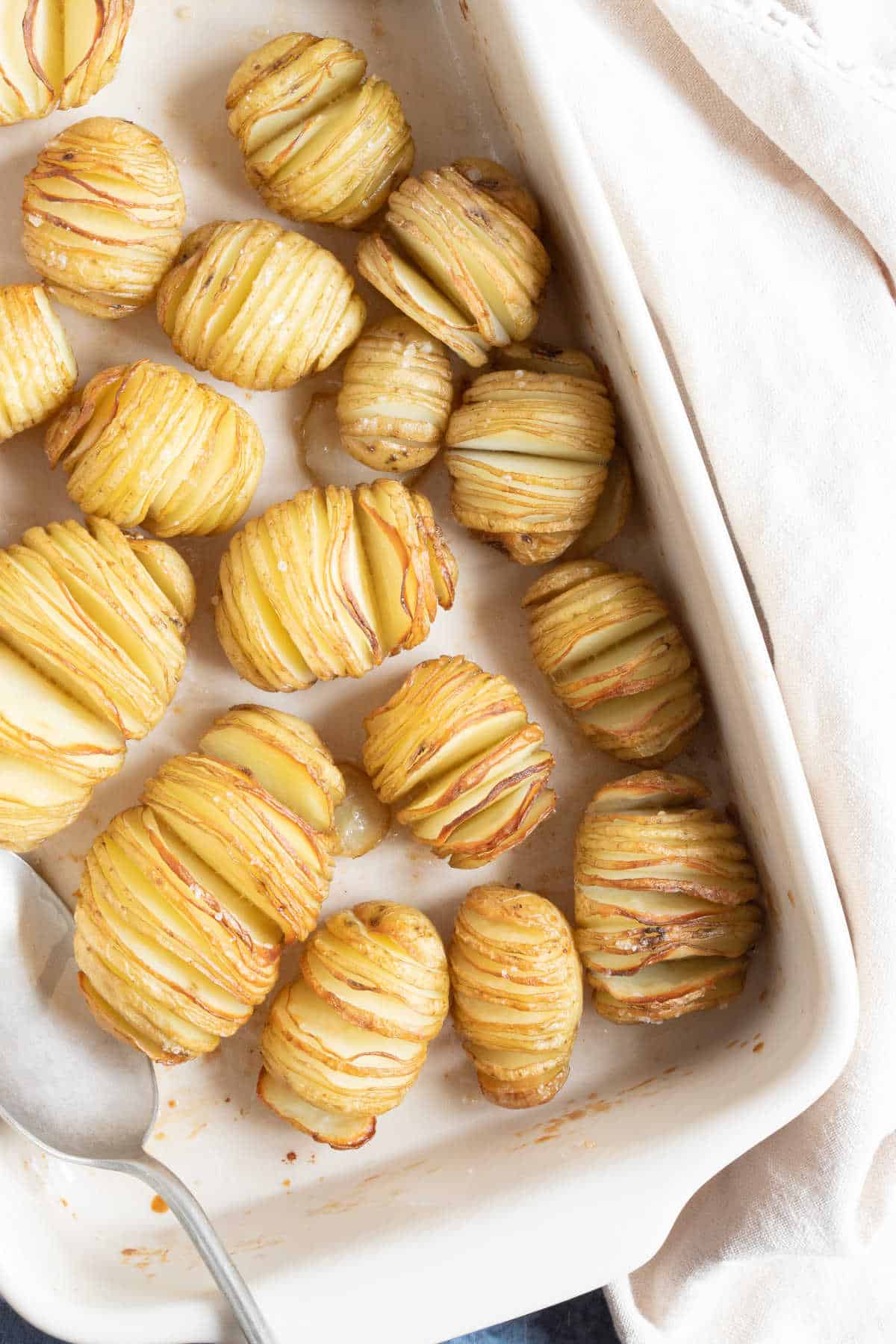 New potato hasselback potatoes in a basking dish.