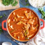 Pork goulash in a red pan.