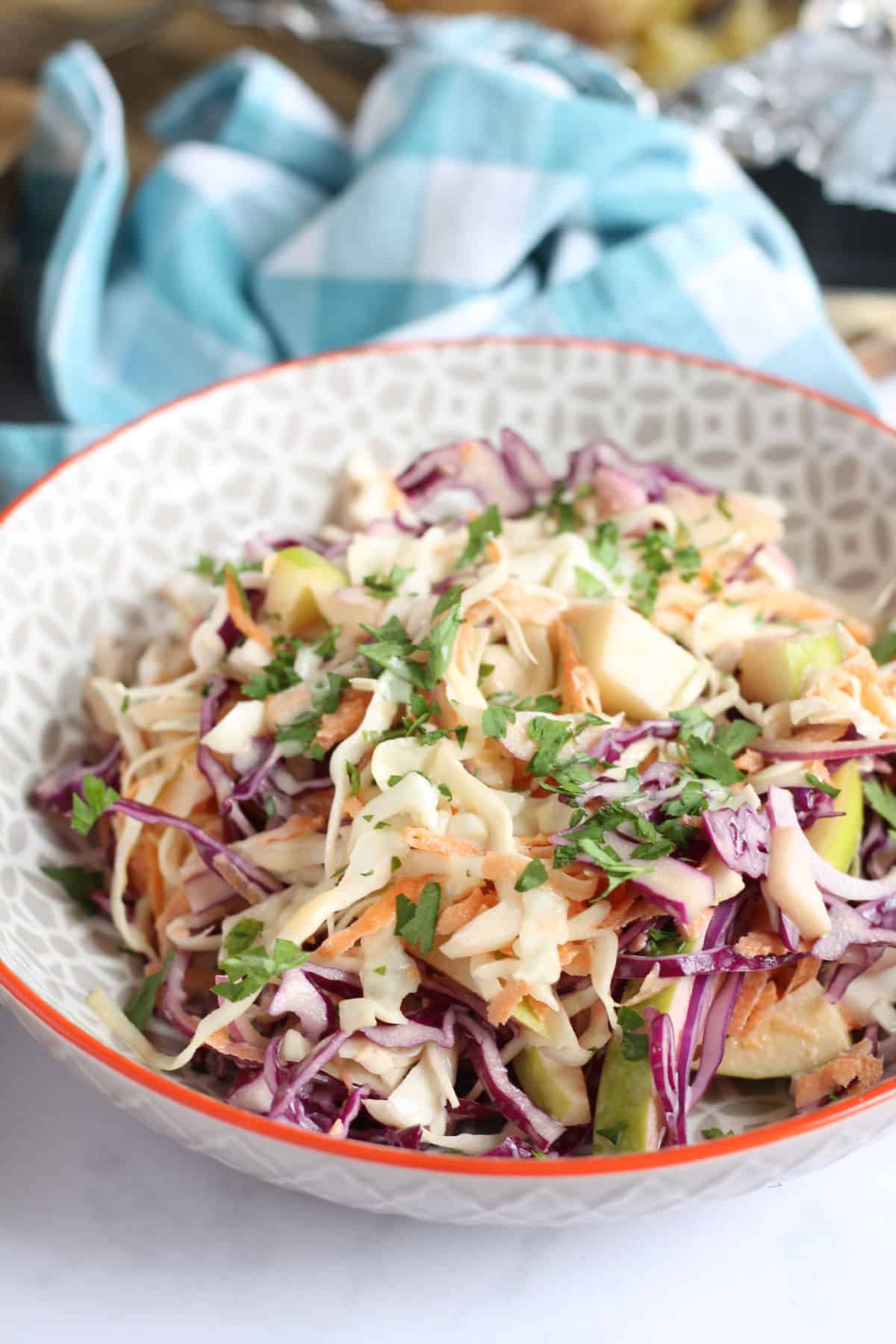 Apple coleslaw in a bowl.