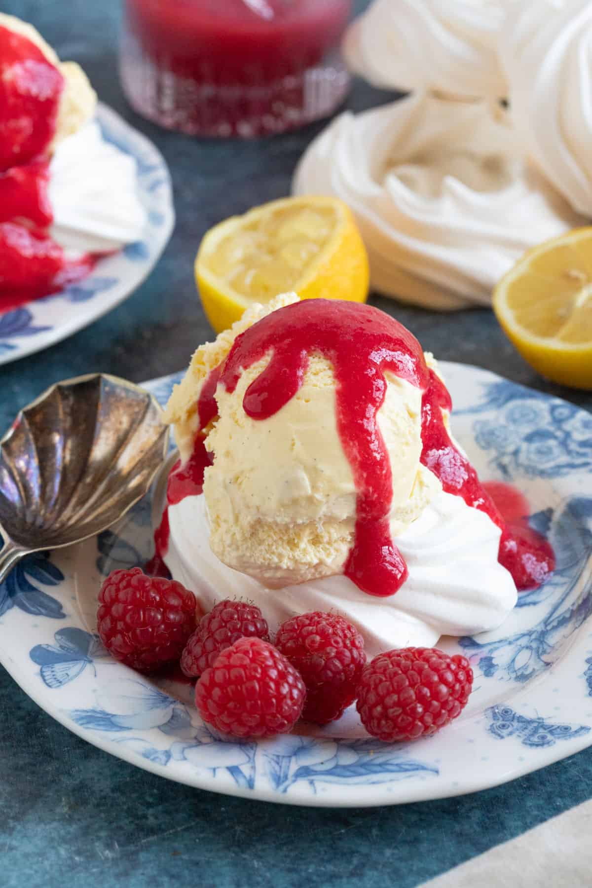 Fresh raspberry coulis drizzled over ice cream.