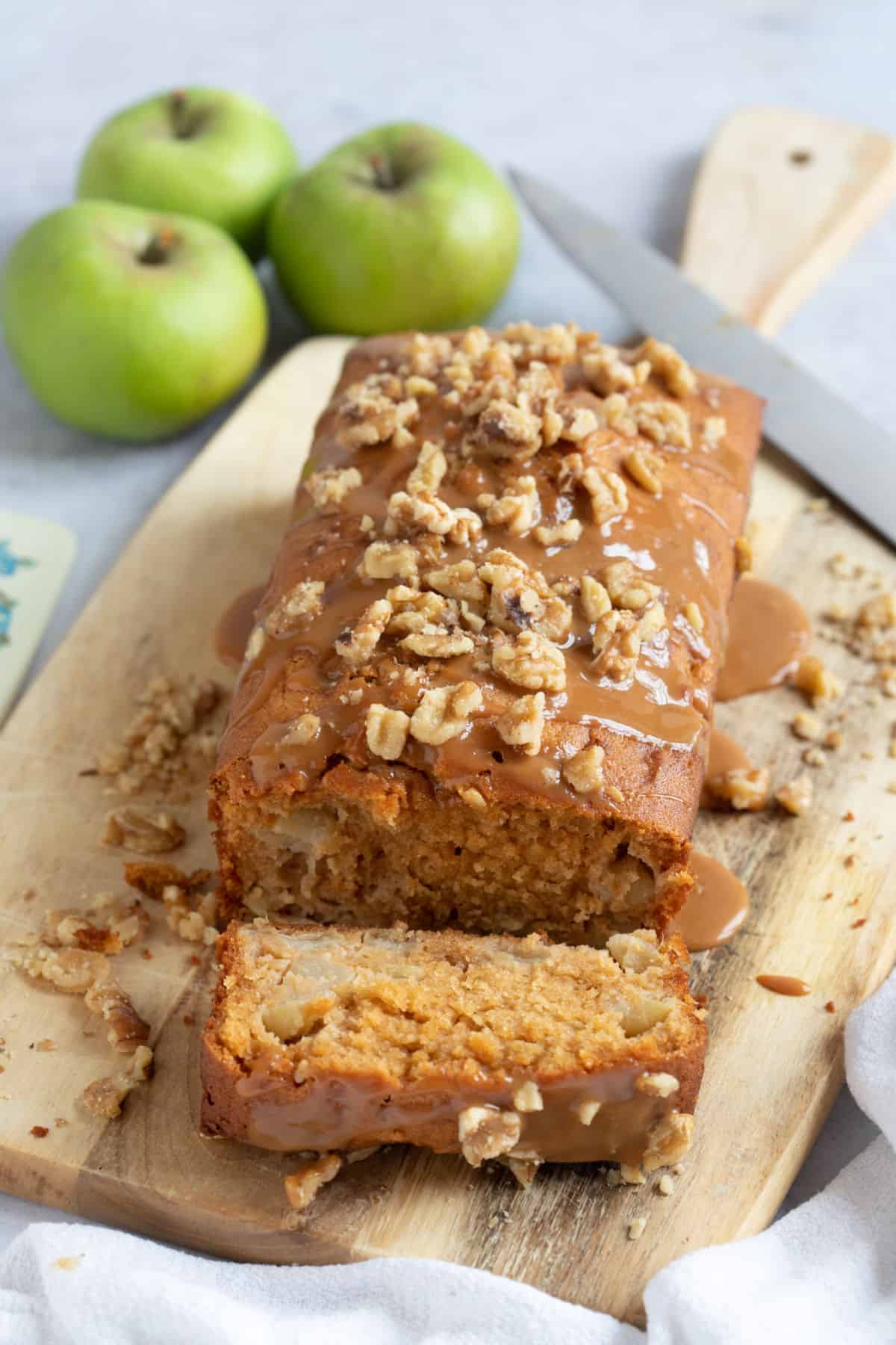 A slice of Bramley apple loaf cake.