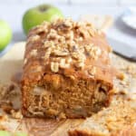 Caramel apple loaf cake on a wooden board.