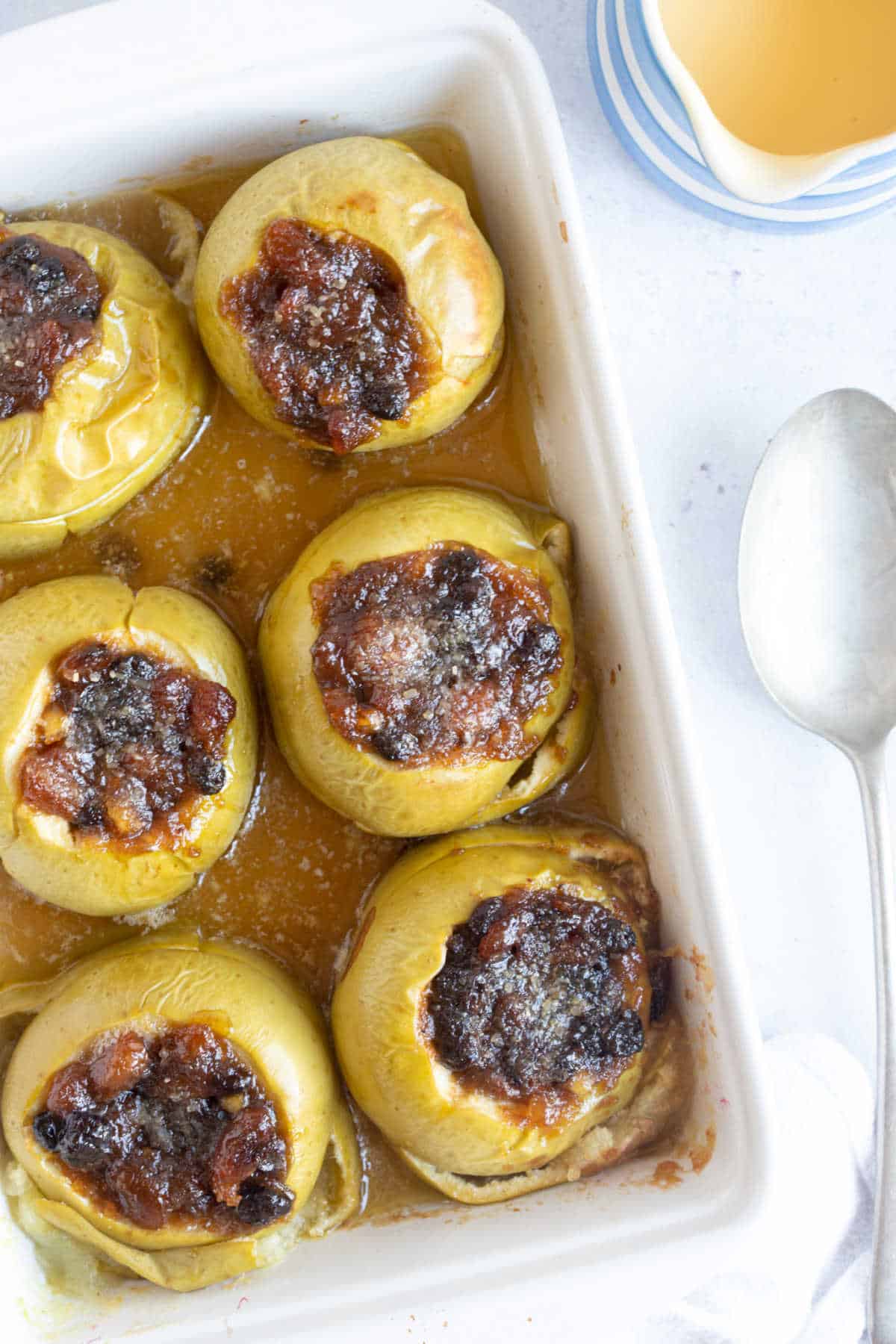 Baked apples in a baking dish.