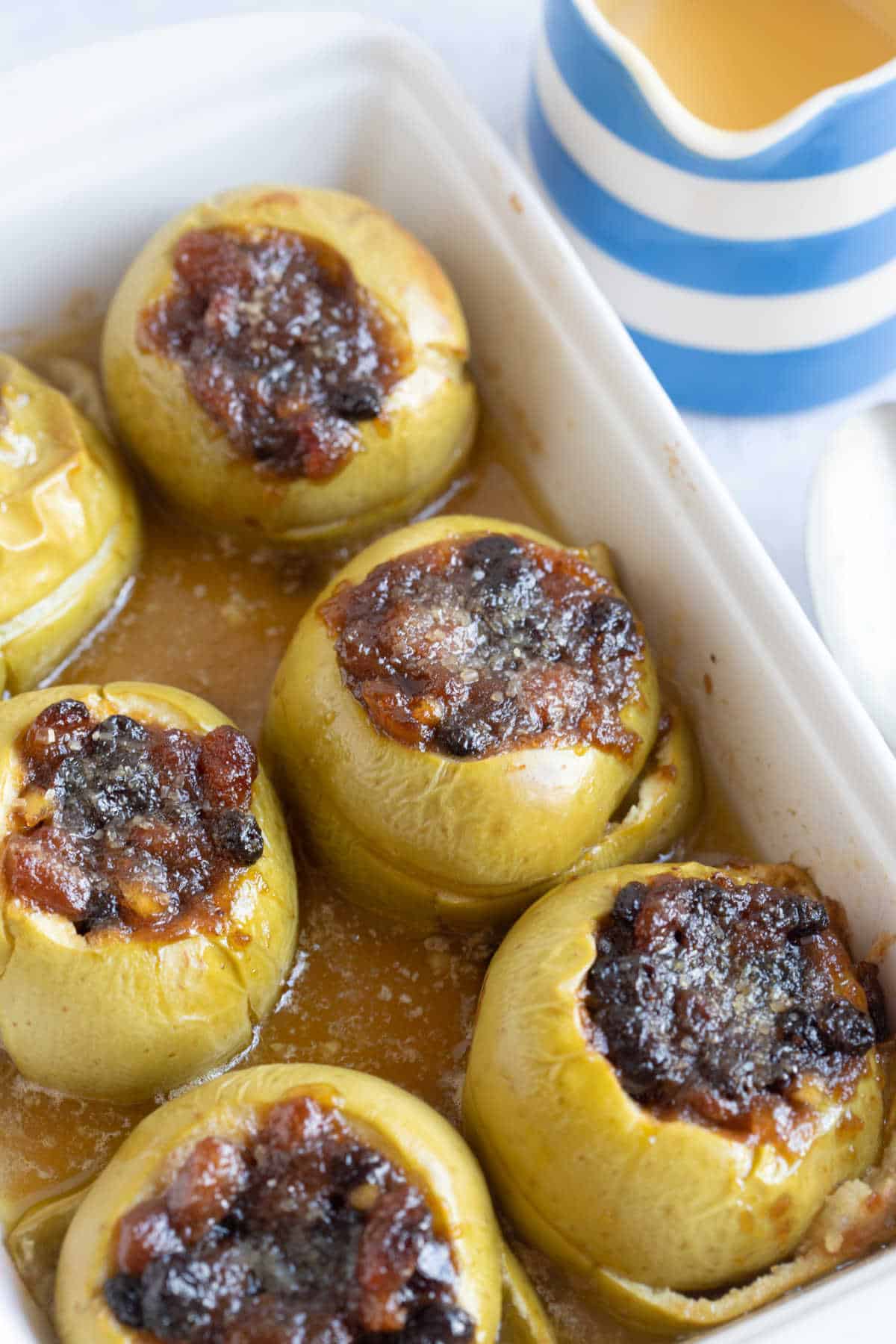 Mincemeat Baked Apples in a white baking dish.