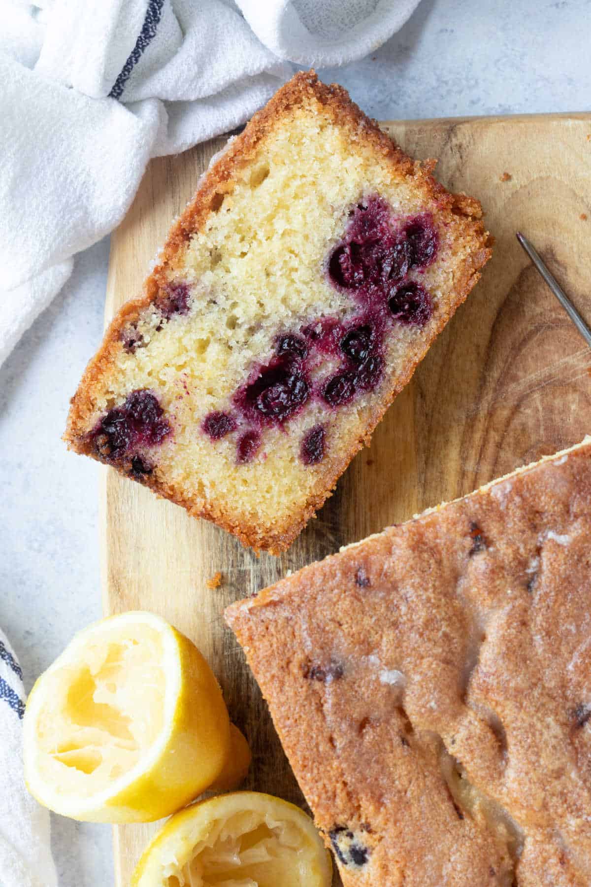 A slice of blackcurrant loaf cake.