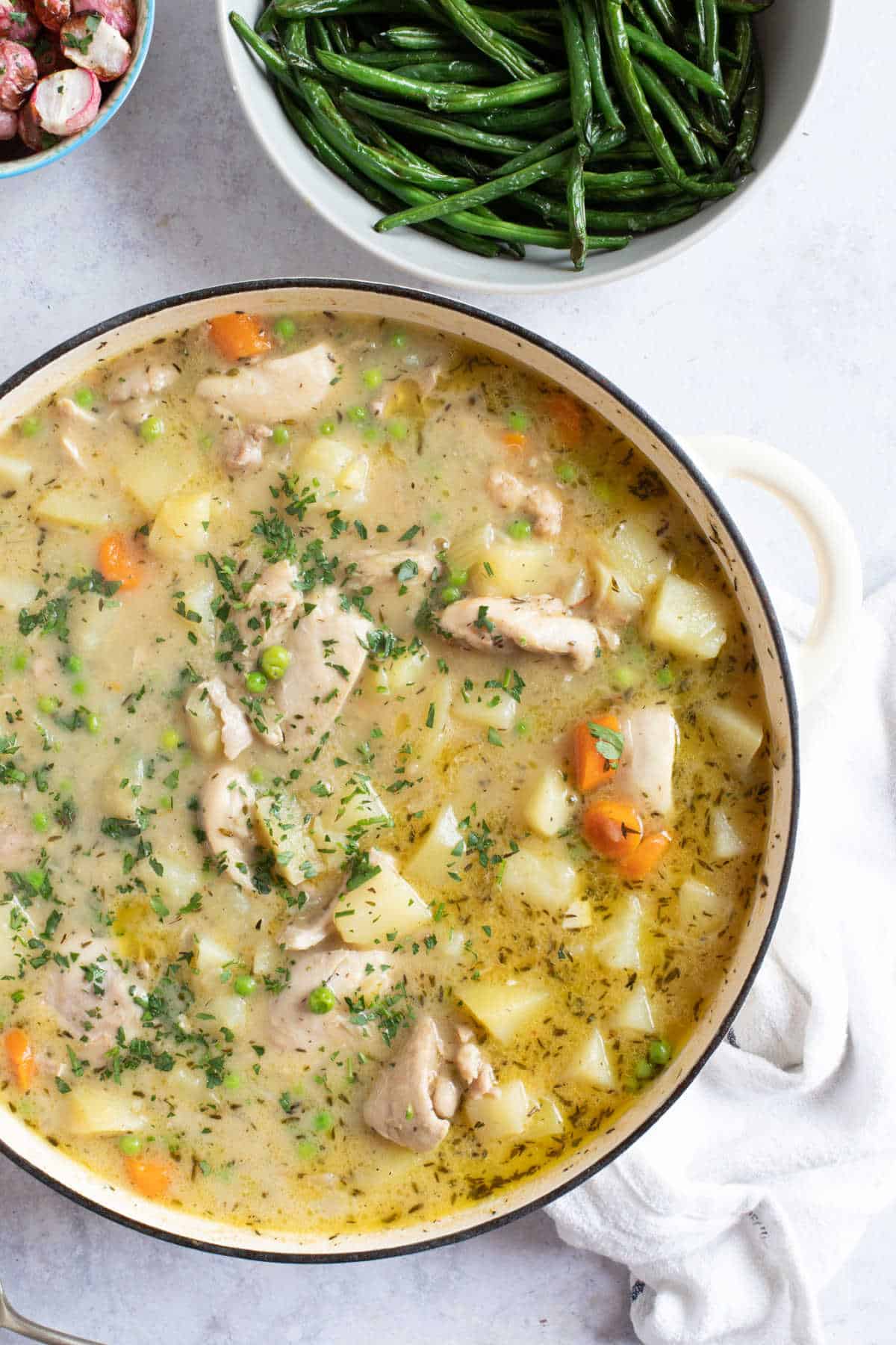Chicken stew in a shallow casserole.