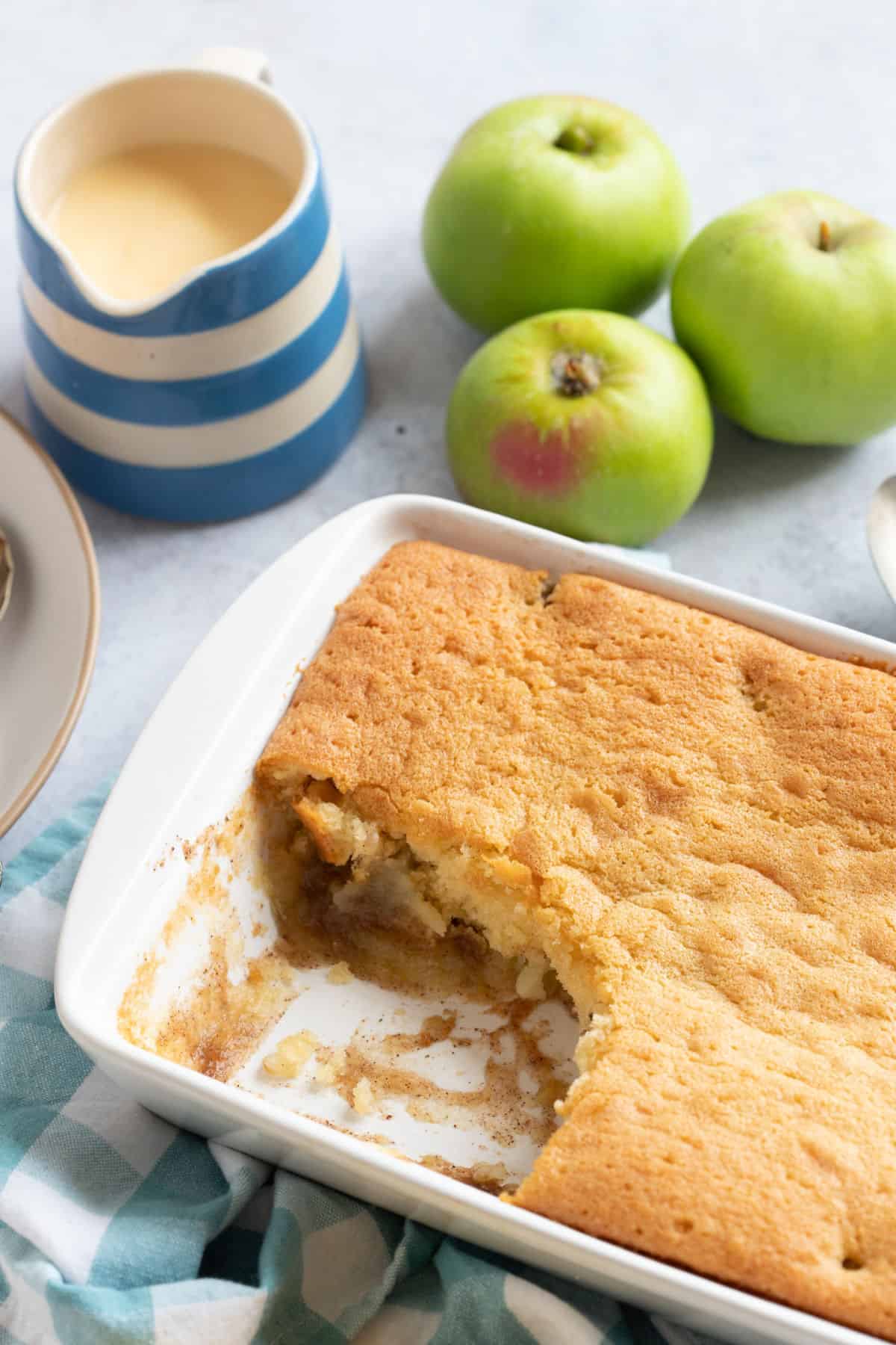 Apple sponge pudding in a pie dish.