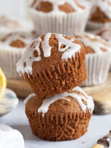 Two gingerbread muffins in a stack.