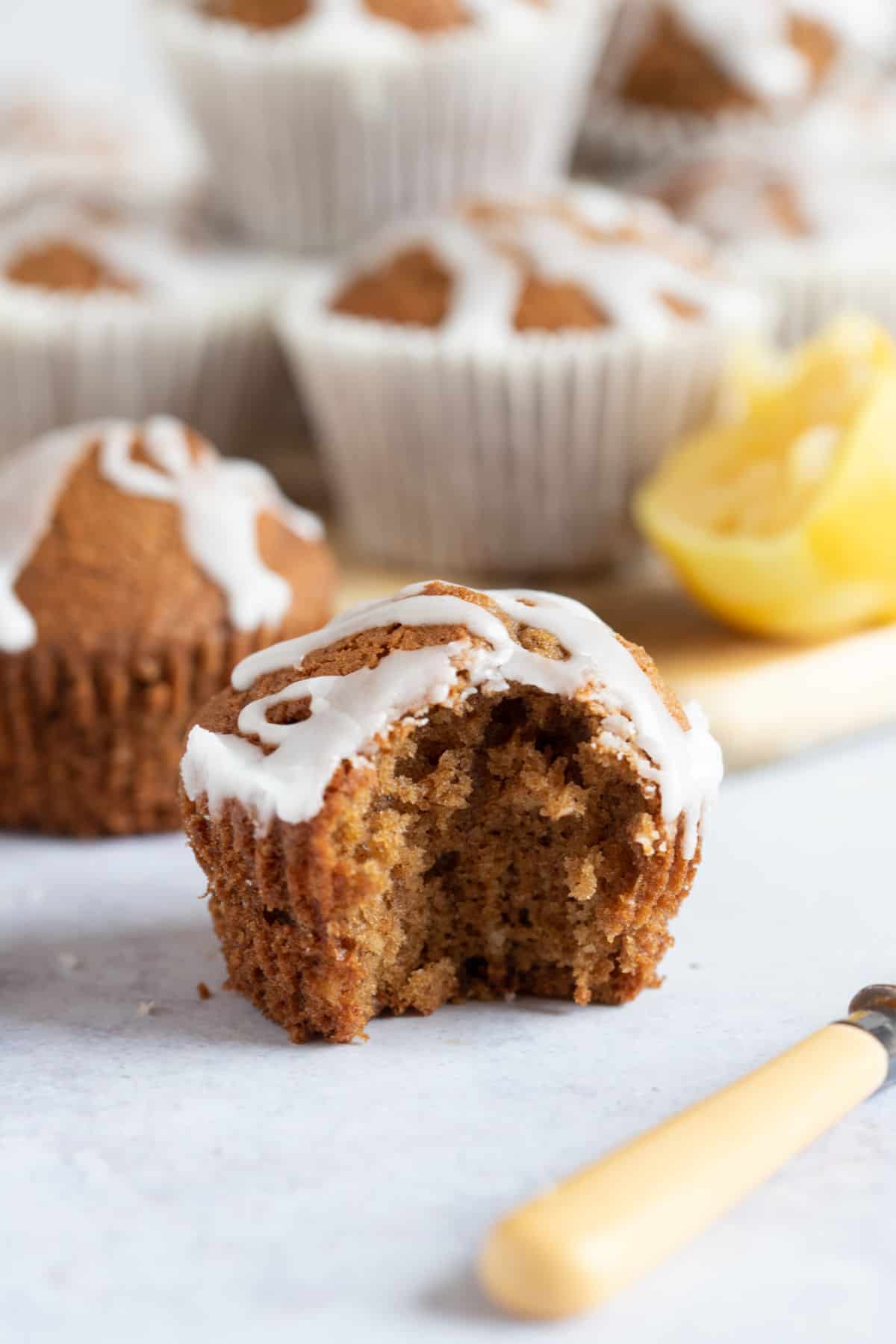 A half eaten gingerbread muffin