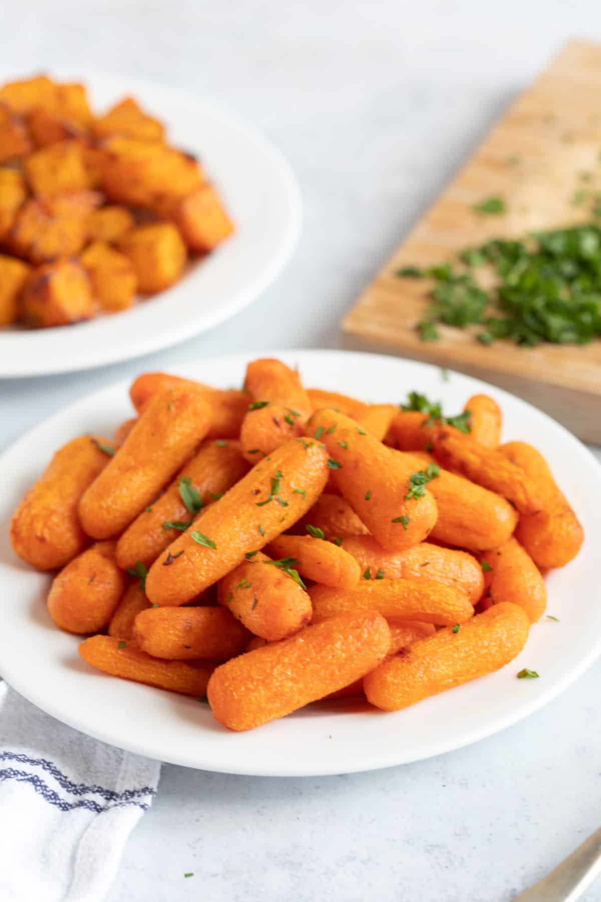 Air fried carrots on a plate.