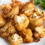 Air fried cauliflower on a plate.