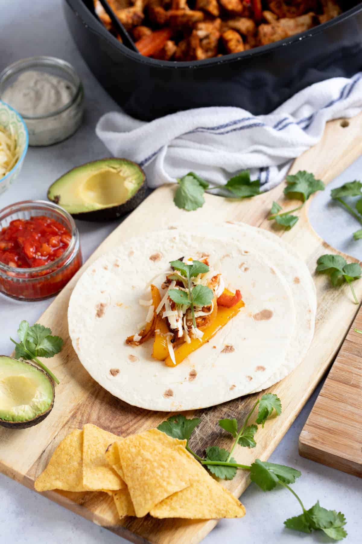 Chicken fajitas in flour tortillas.