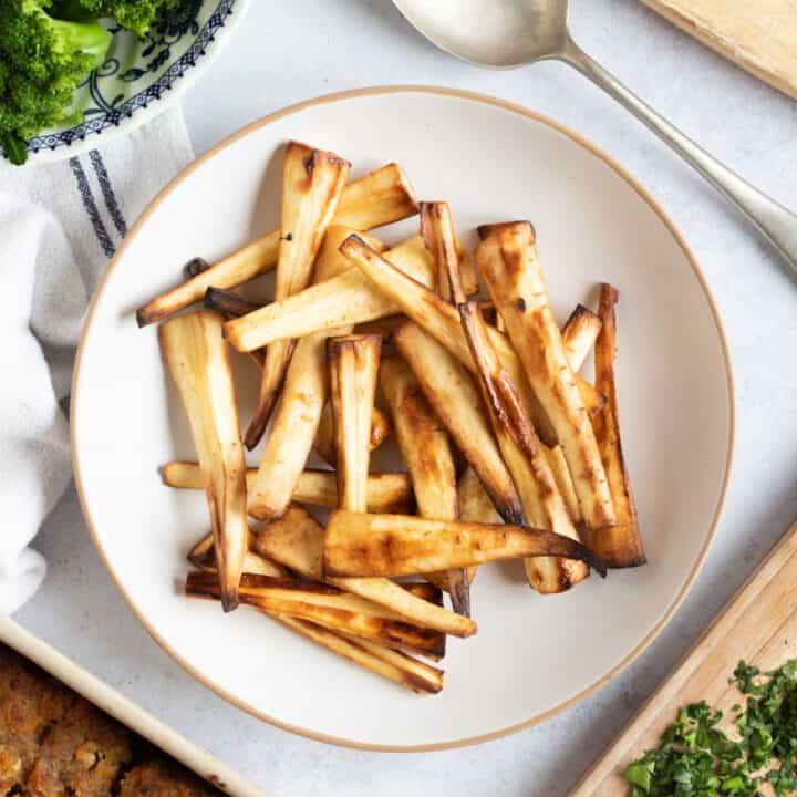 Air fryer parsnips on a plate.