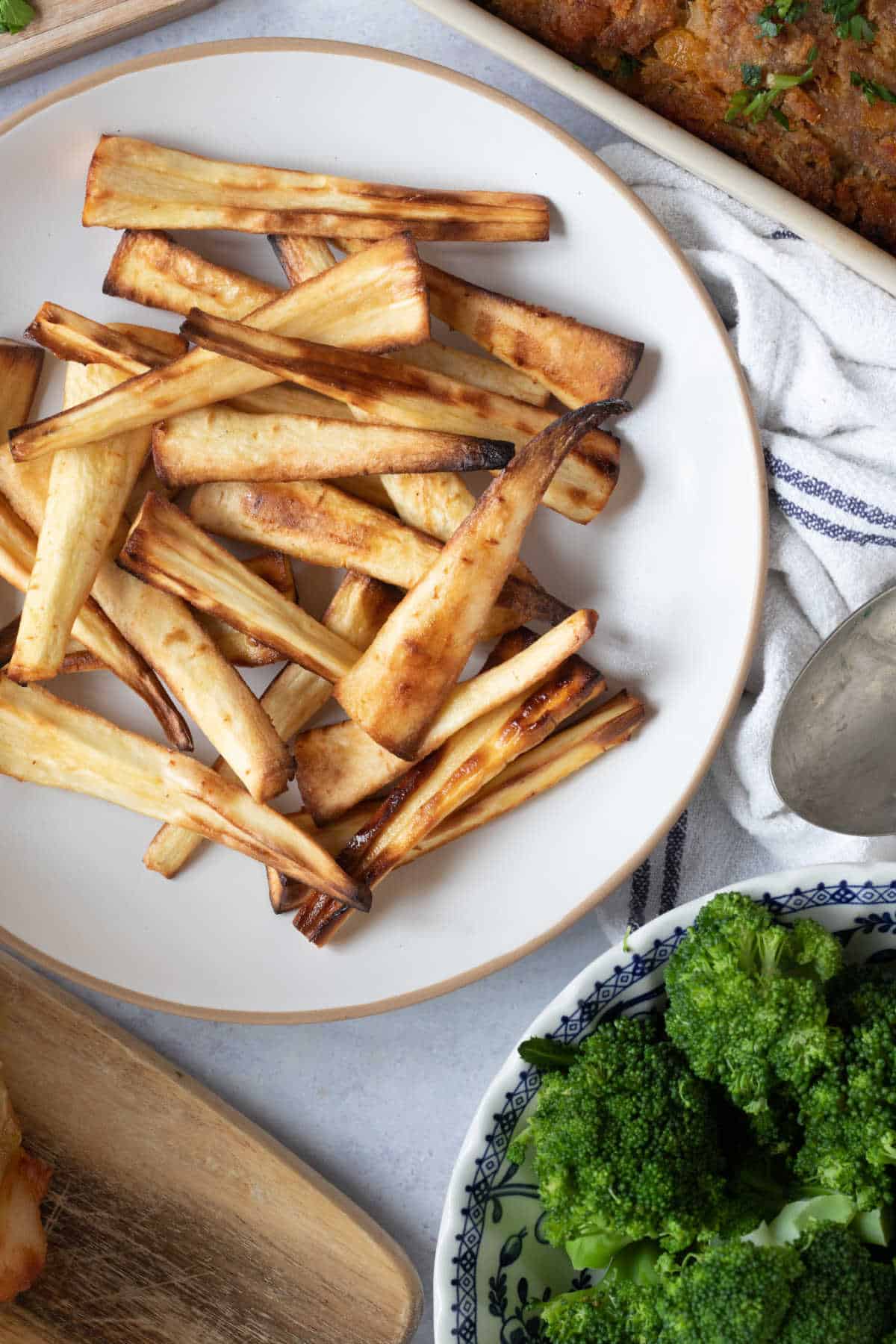 Maple glazed parsnips on a plate.