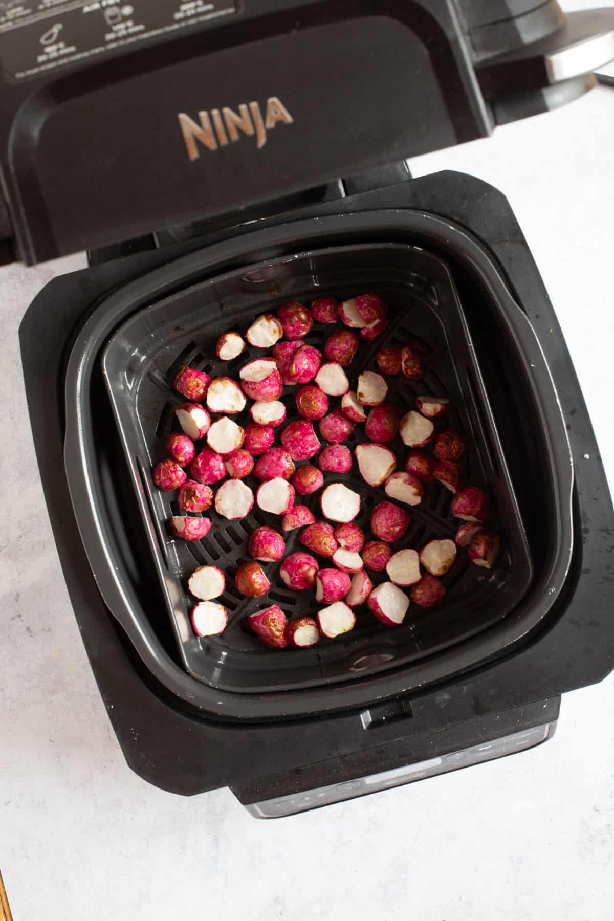 Radishes in an air fryer.