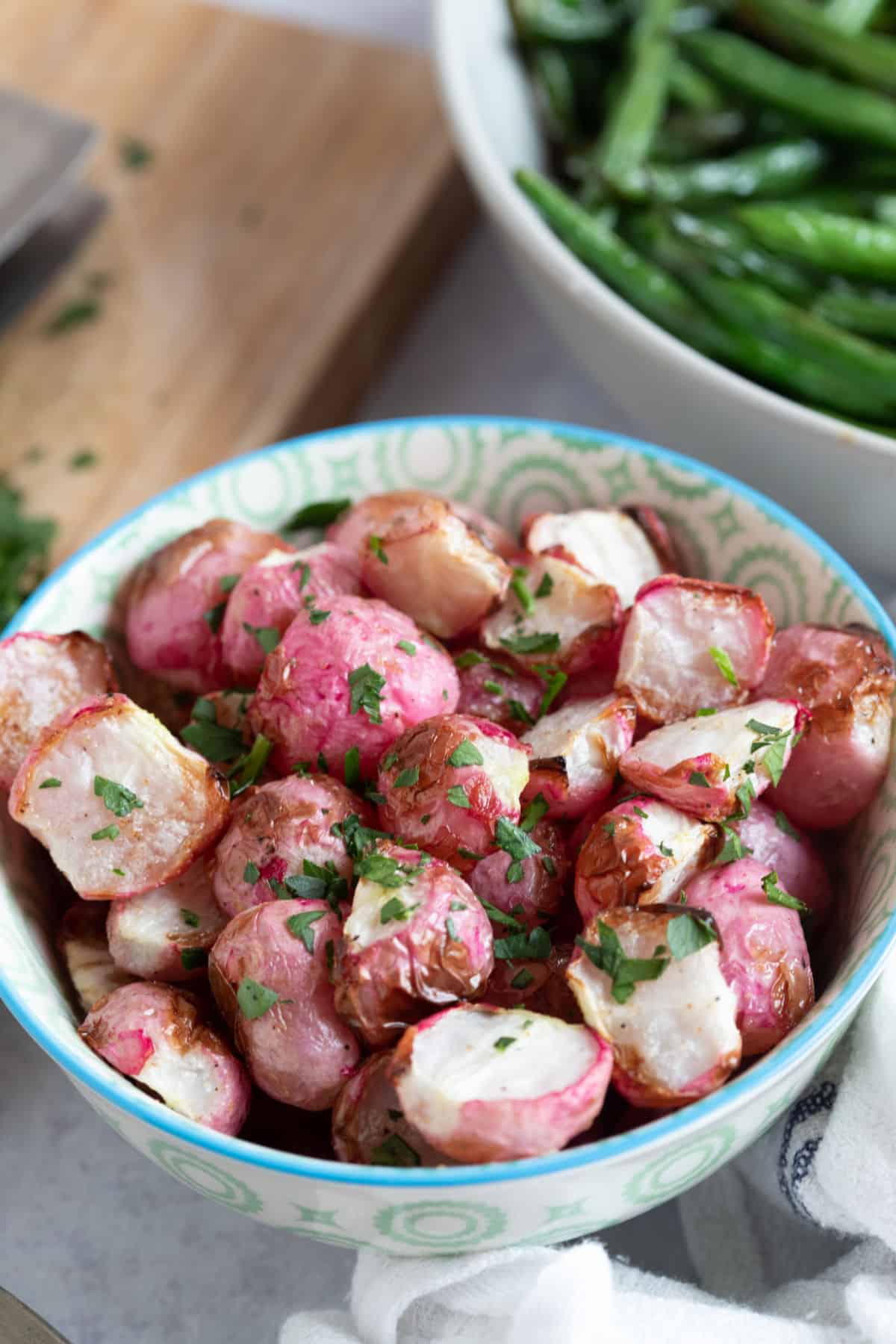 Air fryer radishes in a bowl.