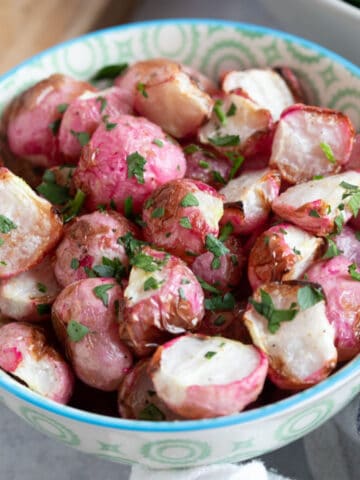 Air fryer radishes in a bowl.