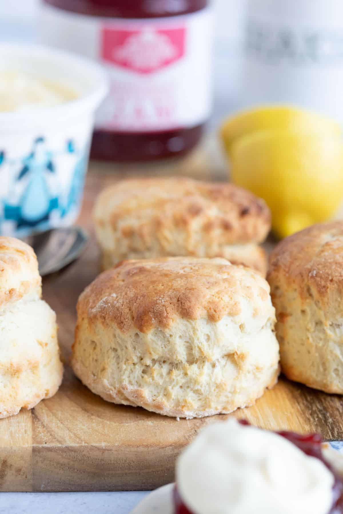 Air fryer scones on a wooden board.