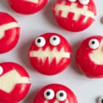 Babybel cheese monsters on a plate.