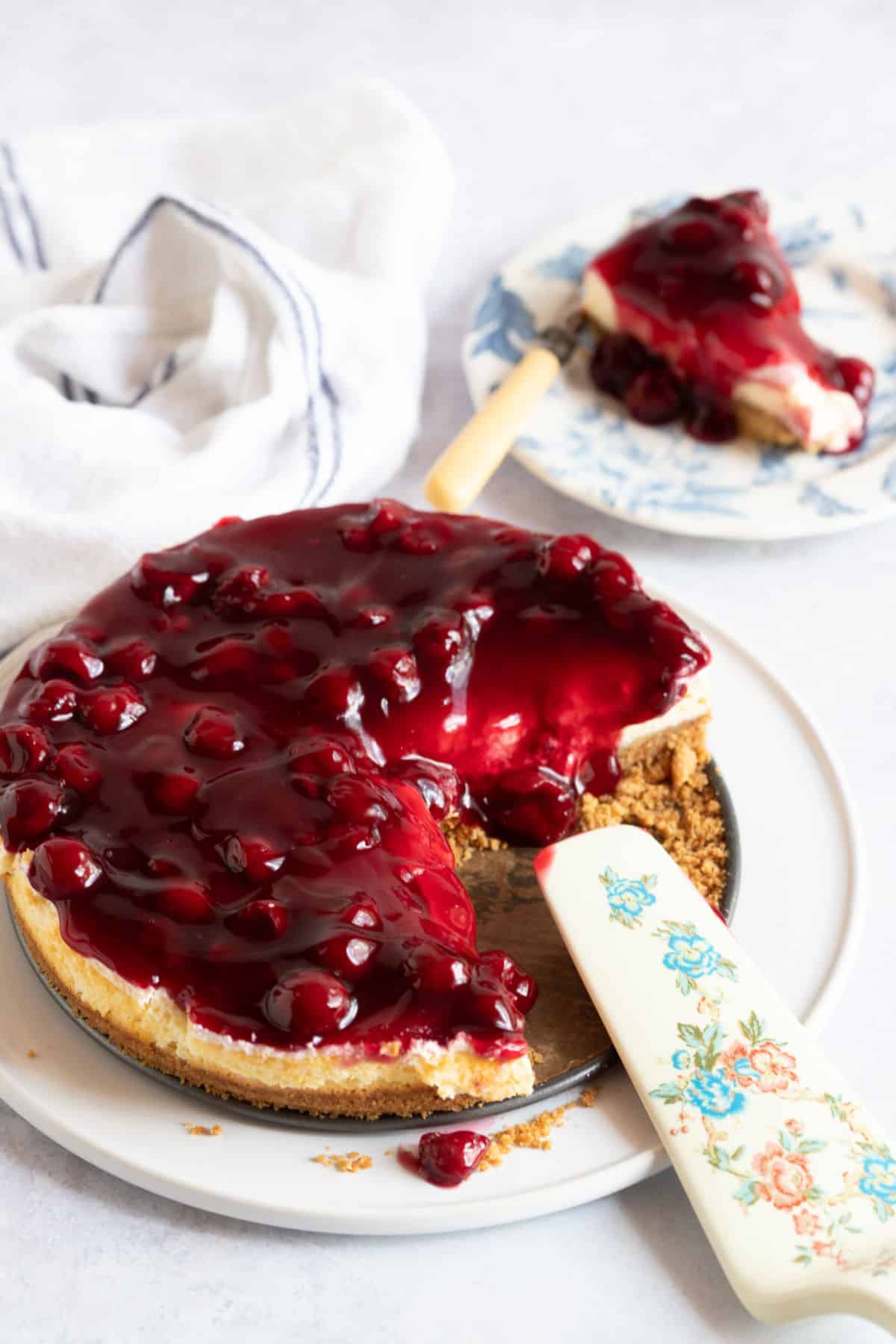 Cherry Cheesecake on a serving plate.