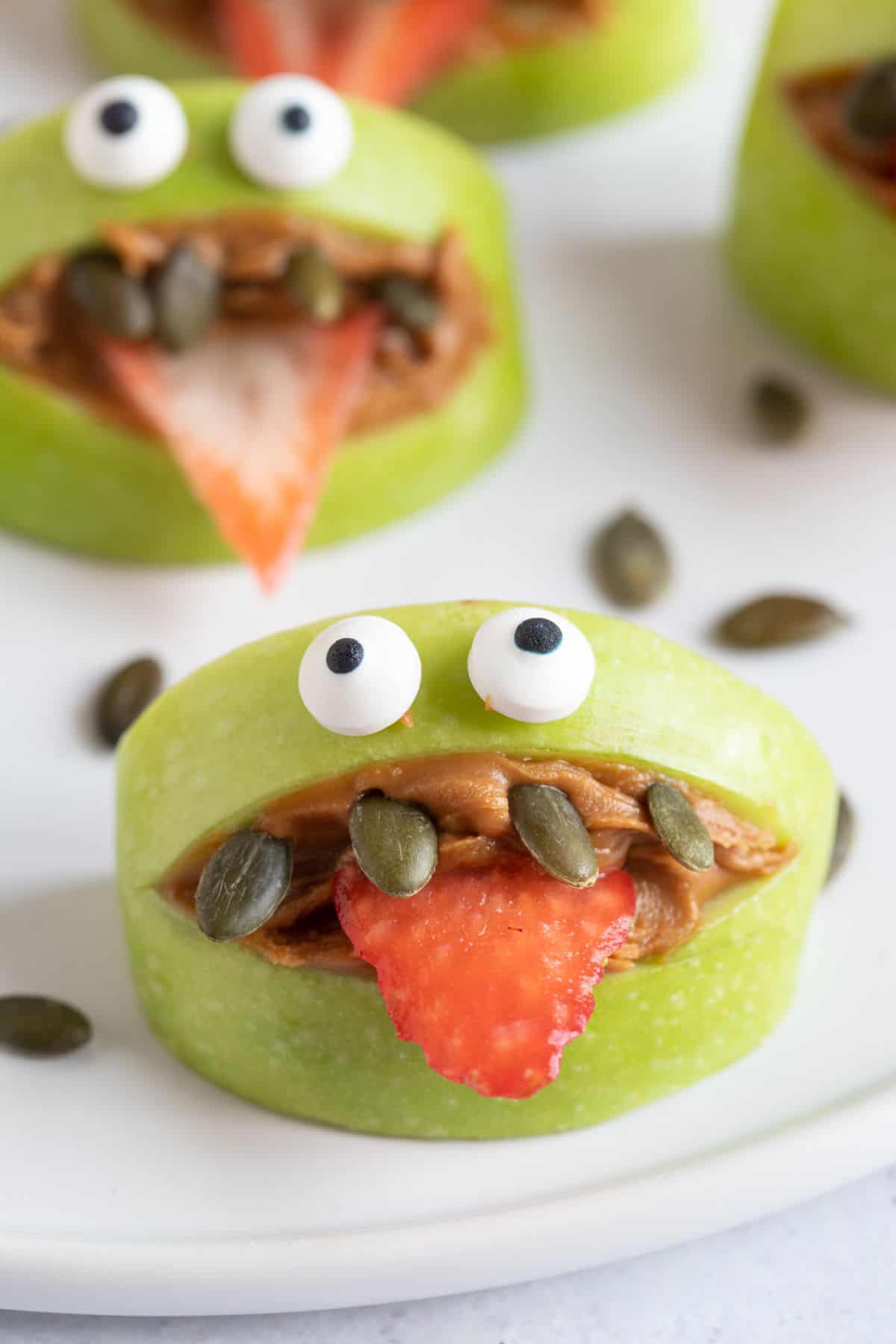 Halloween apple monster on a plate.