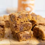 A stack of pumpkin blondie bars.