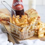 Air fryer chips in a basket.