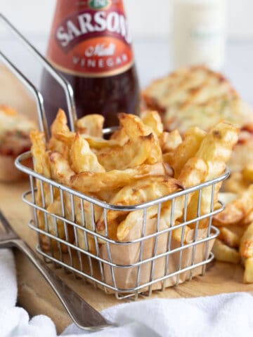 Air fryer chips in a basket.