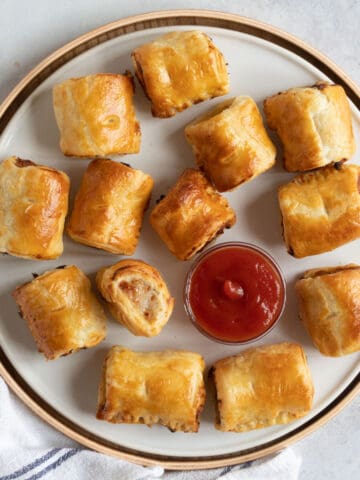 A plate of air fryer sausage rolls.