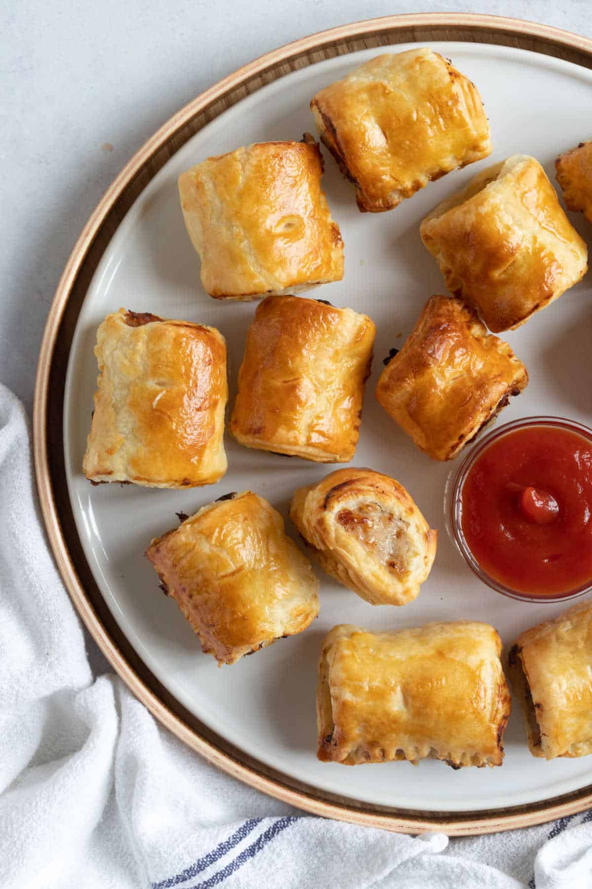 A plate of air fryer sausage rolls.