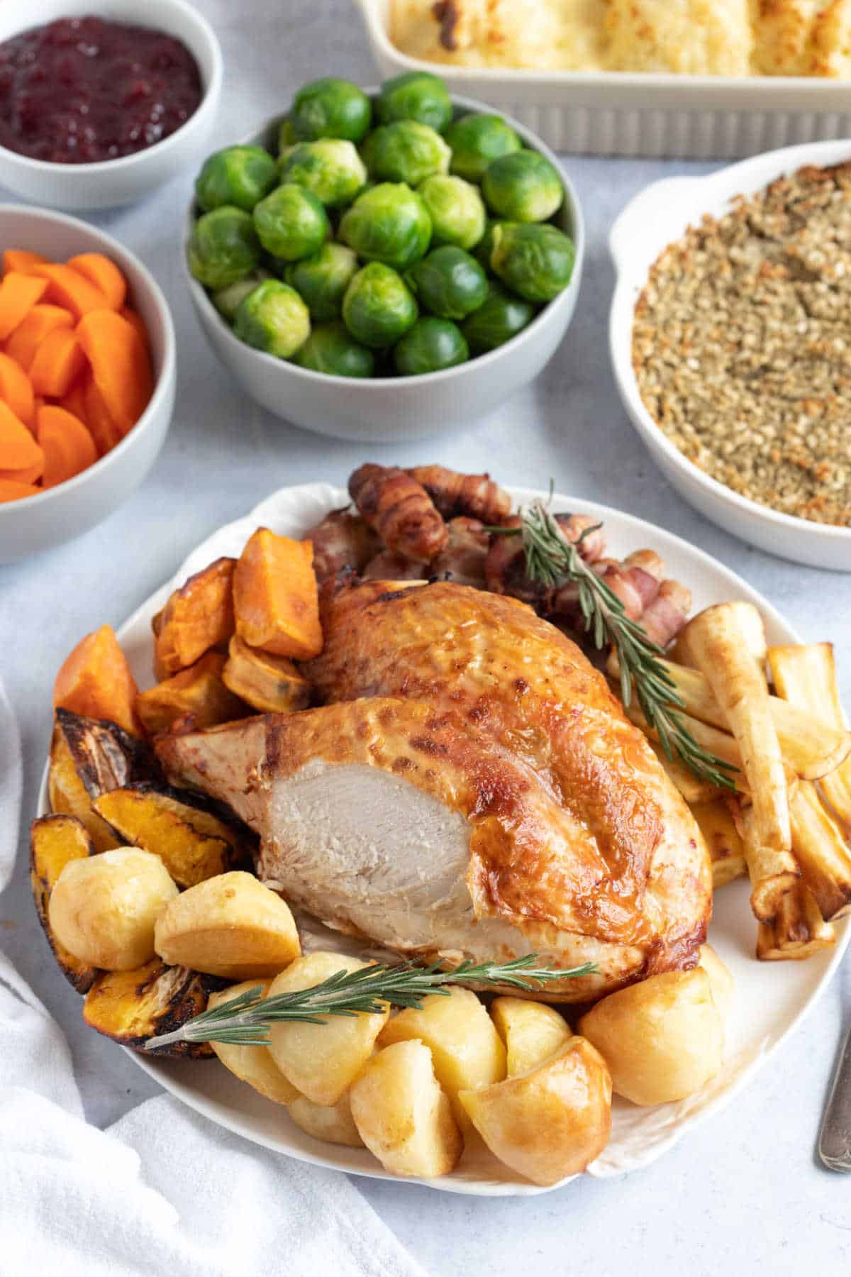 Air fryer turkey crown with Brussels sprouts and roast potatoes.