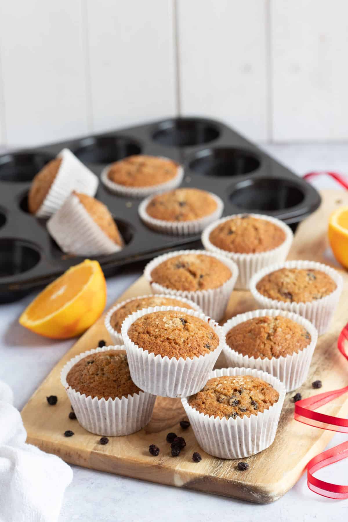 Christmas morning muffins on a wooden board.