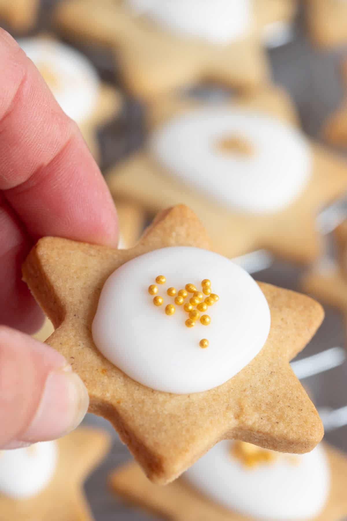 Christmas star biscuit with white icing.