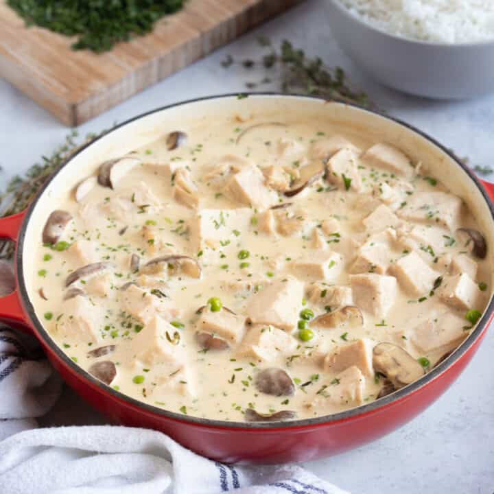 Leftover Turkey Fricassee in a red pan.