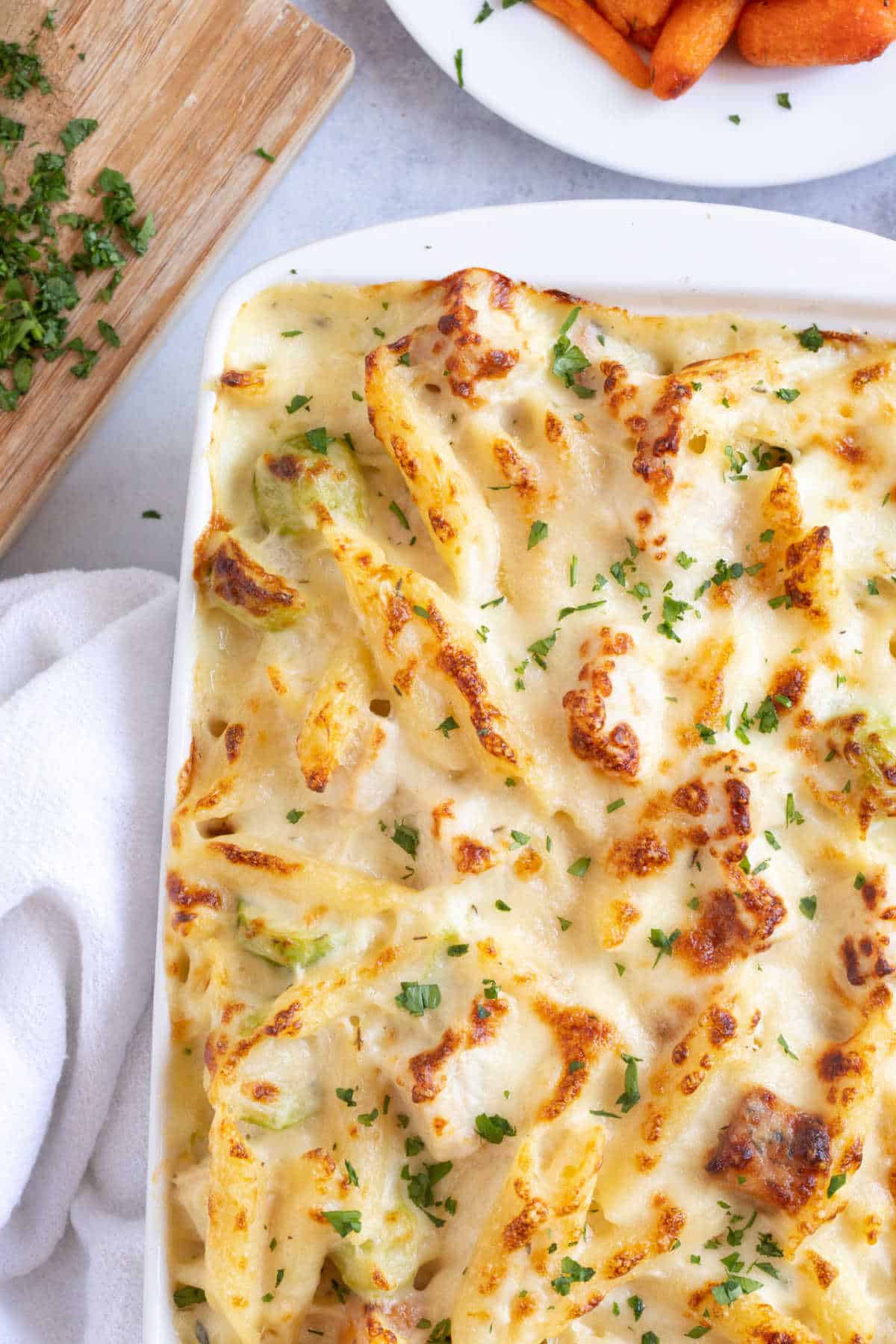 Turkey pasta bake in a white baking dish.