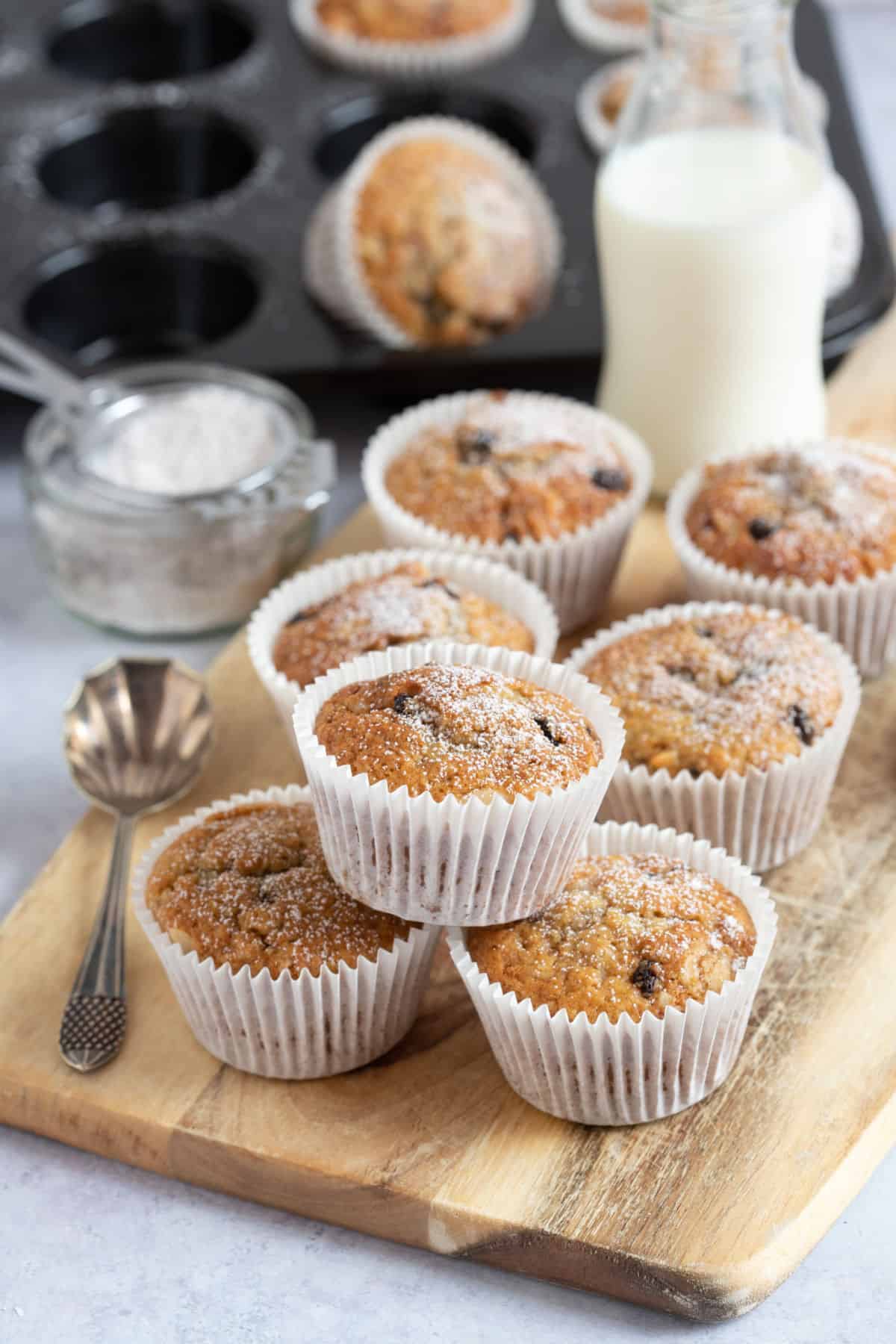 Stollen muffins on a wooden board.