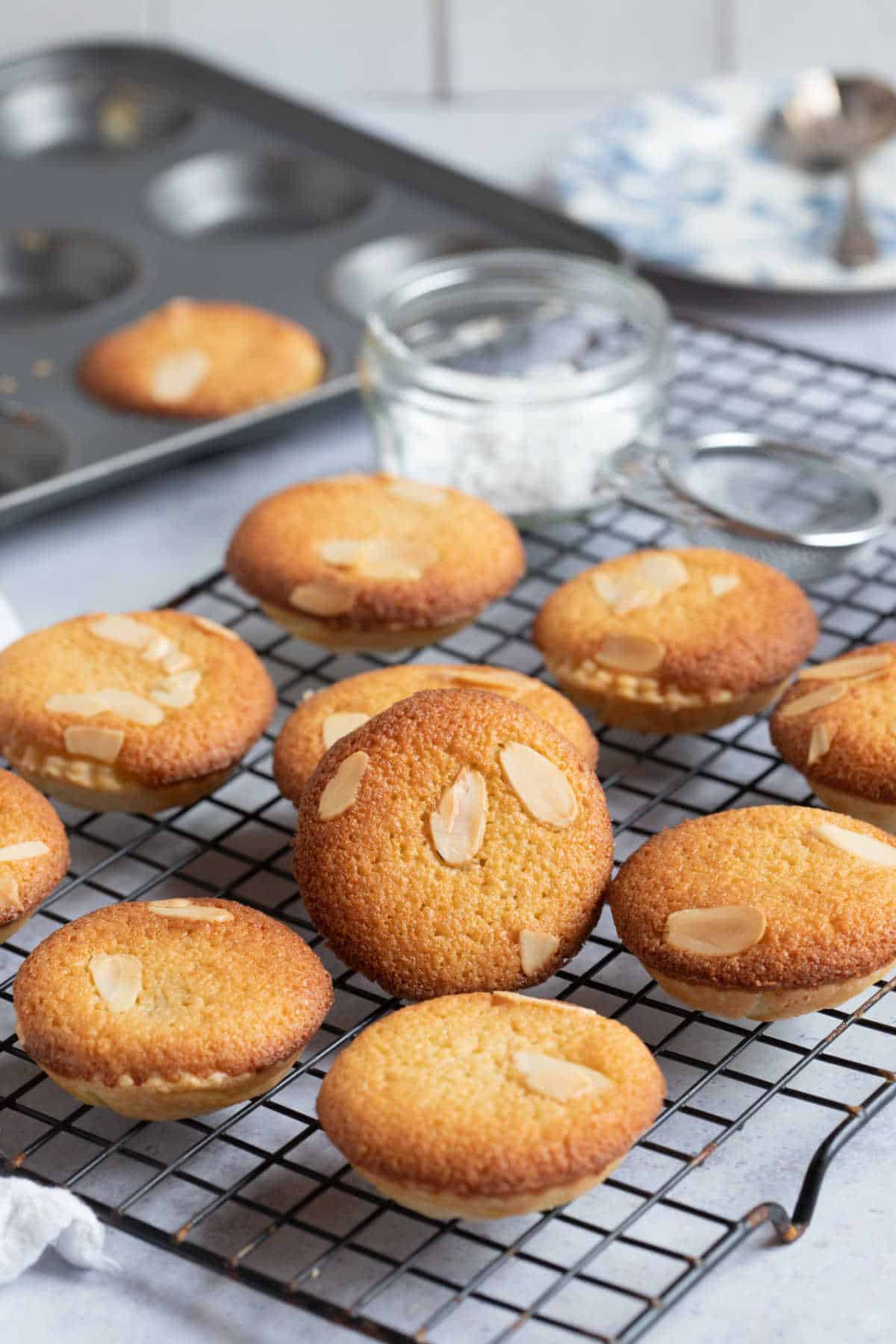 Frangipane mince pies on a wire rack.