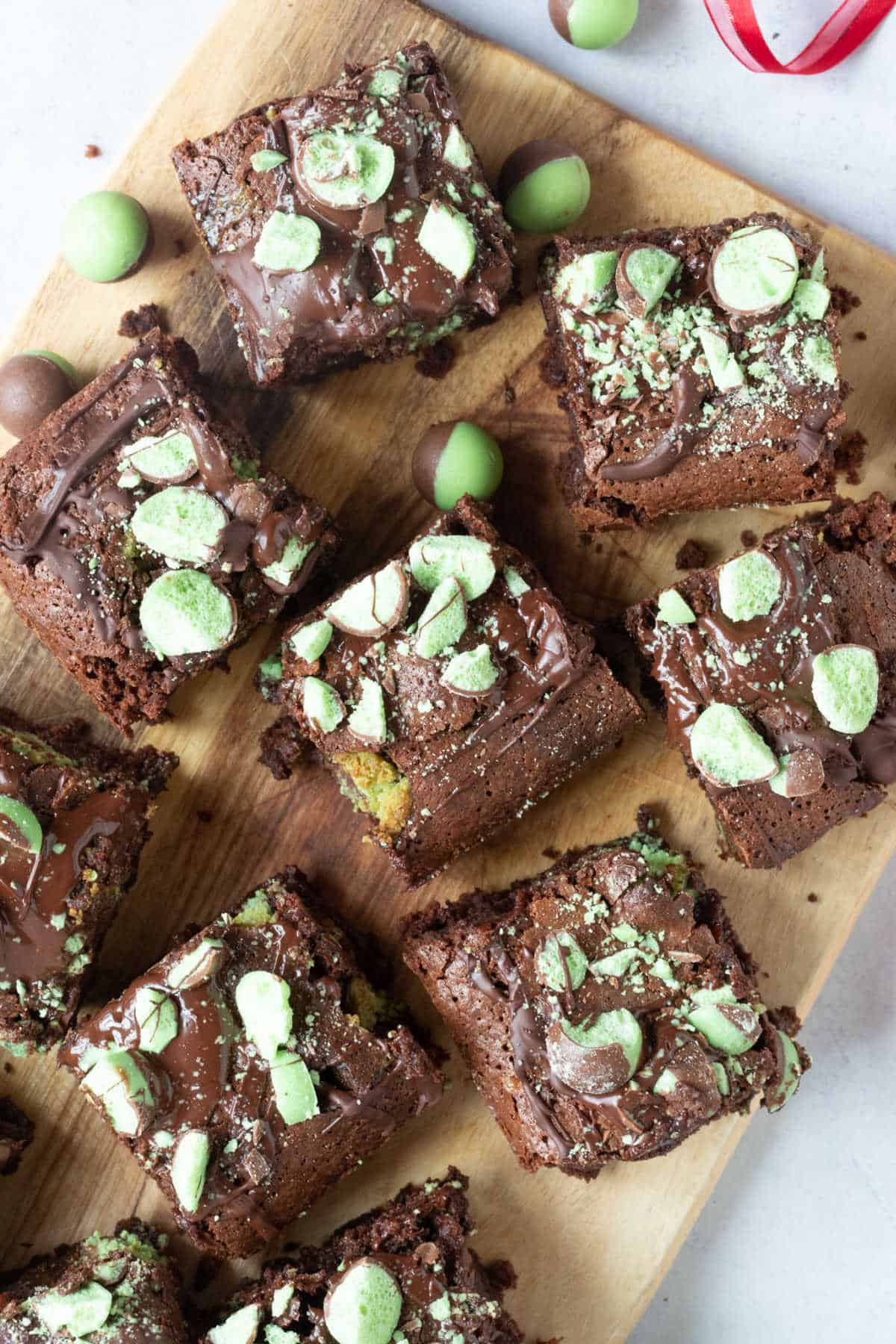 Mint aero chocolate brownies on a wooden board.