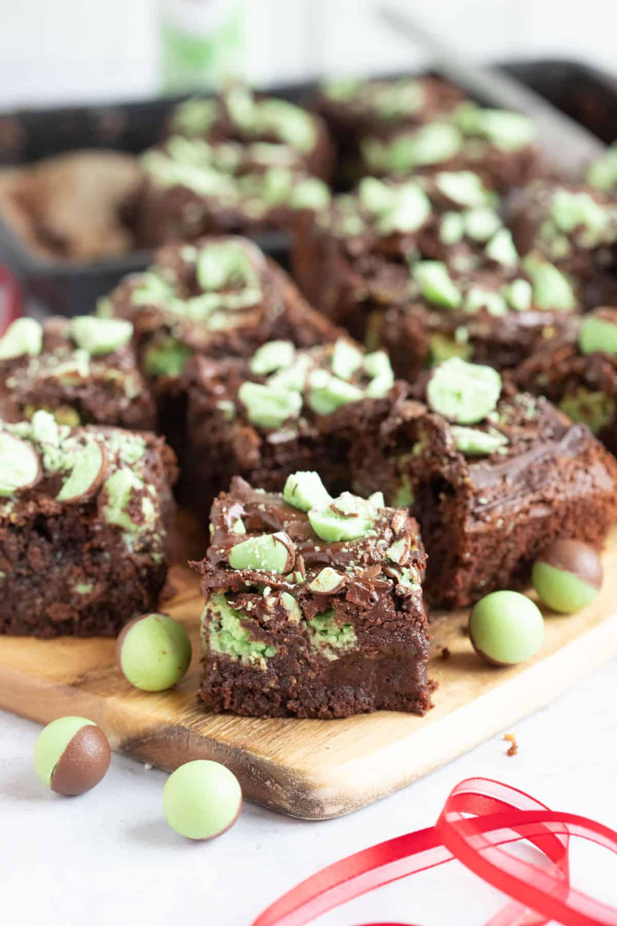 Mint Aero brownies on a wooden board.