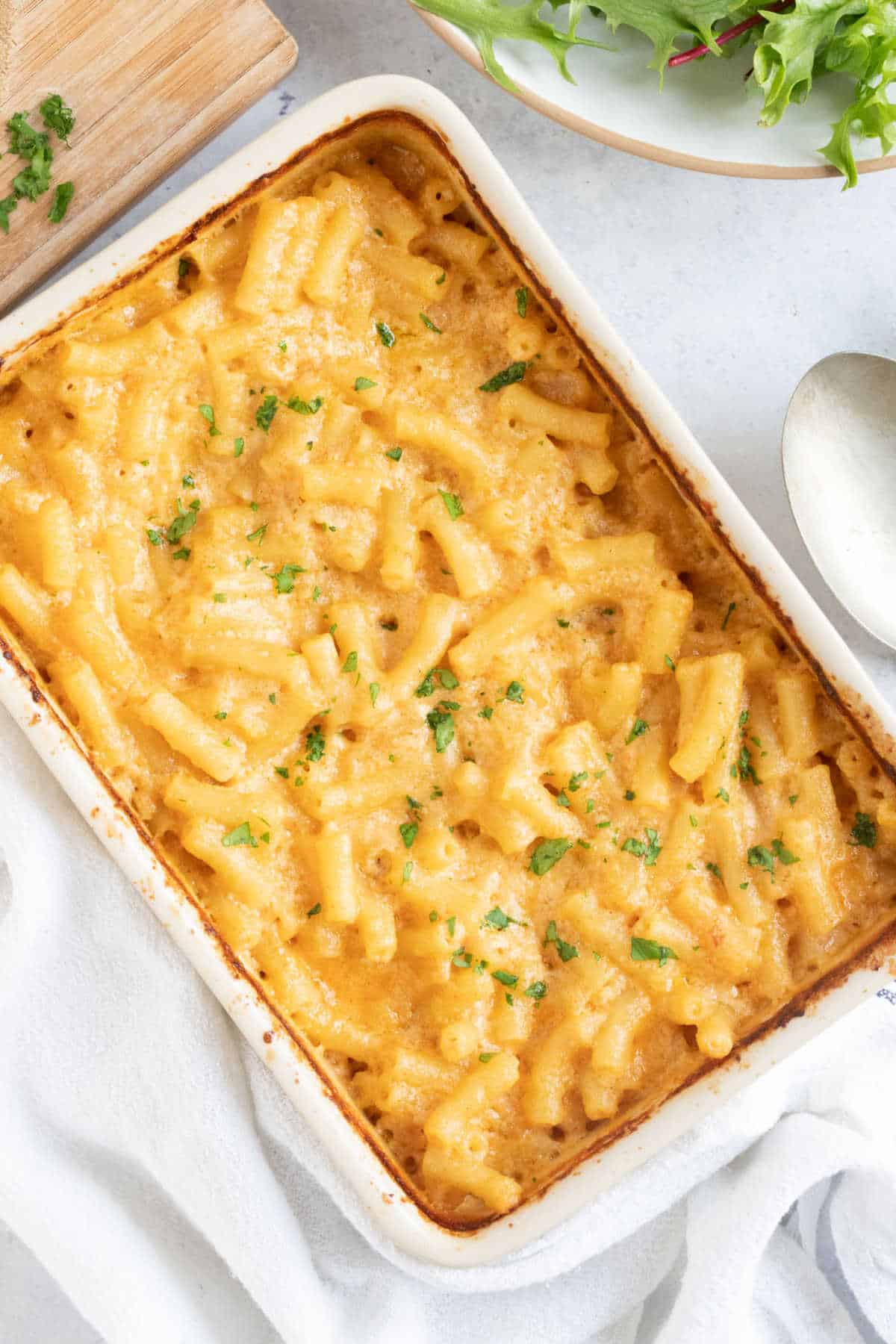 Air fryer mac and cheese with a green side salad.