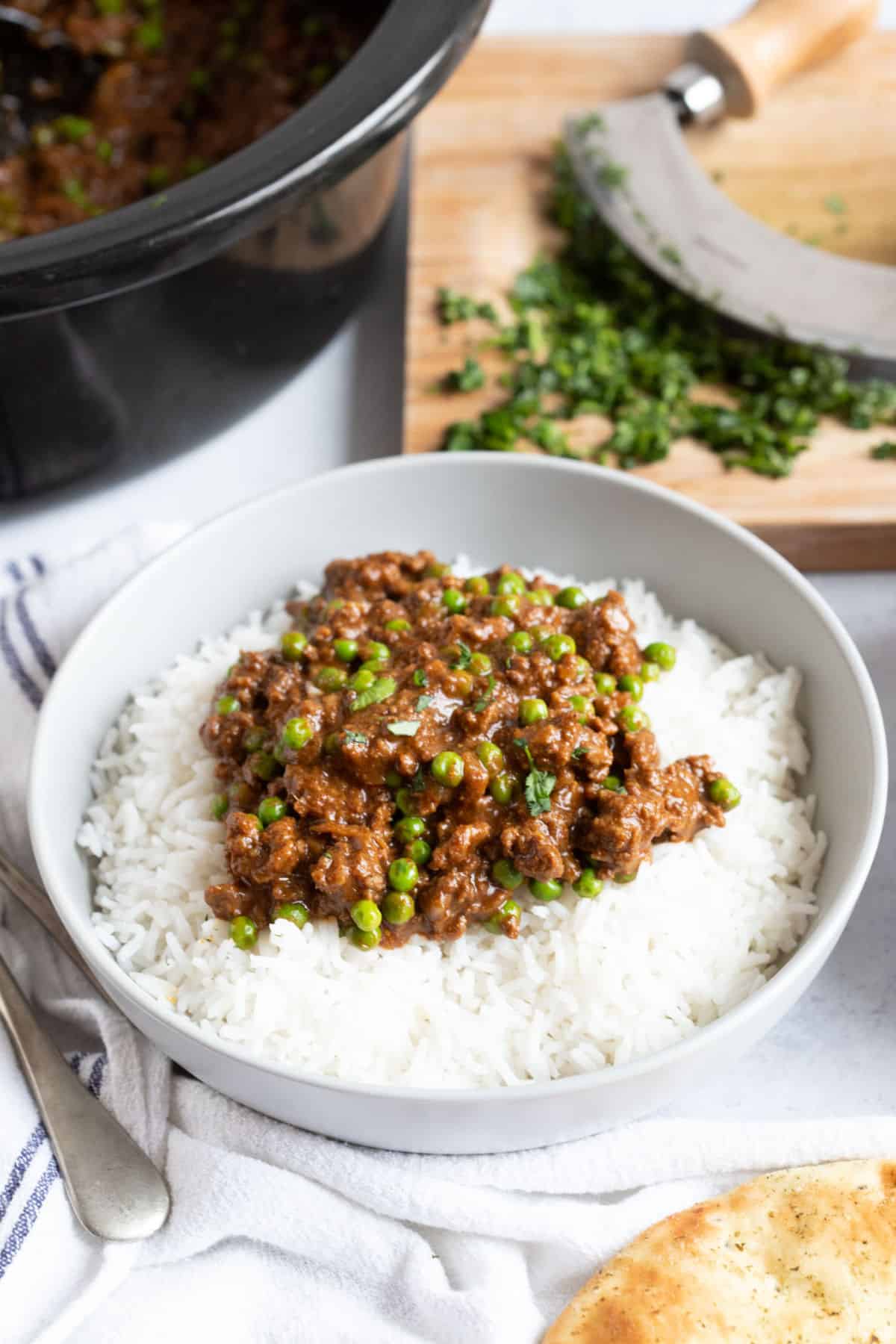 A bowl of slow cooker  beef keema with rice.